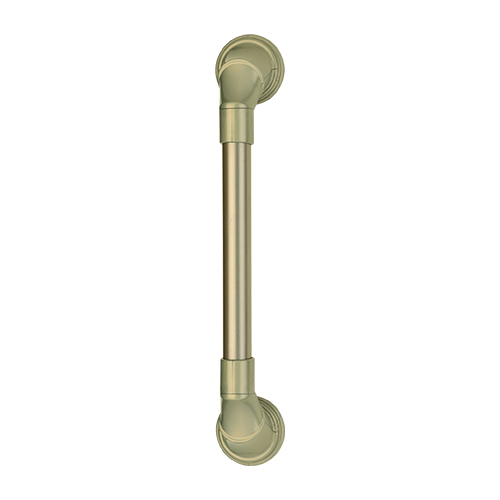A gold colored handle with two round knobs.
