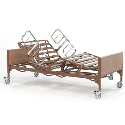 A hospital bed with wheels and rails on the side.