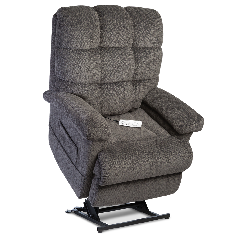 A gray recliner with the handle up and remote control on it.