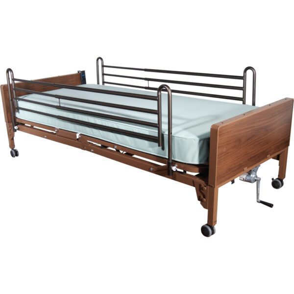 A bed with rails and wheels on the side.