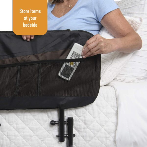 A woman is holding a bag on her bed