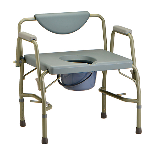 A commode chair with the seat up and bucket in front of it.